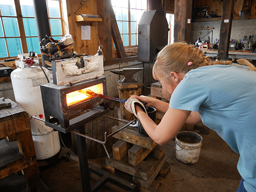 Putting plane blade into forge