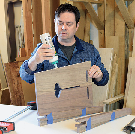 Adding glue to table panel to attach legs