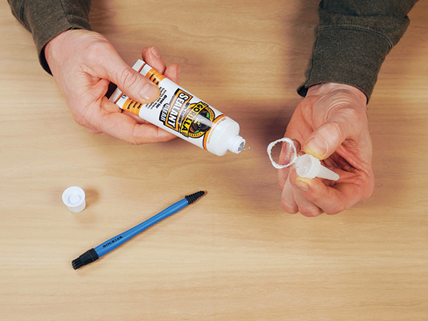 Glue Brushes Double as Nozzle Cleaners