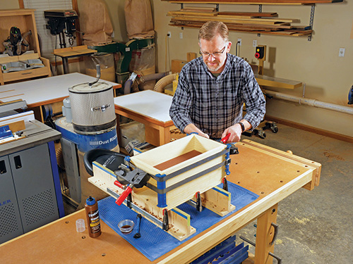 Using cauls to hold together glue carcass during glue-up