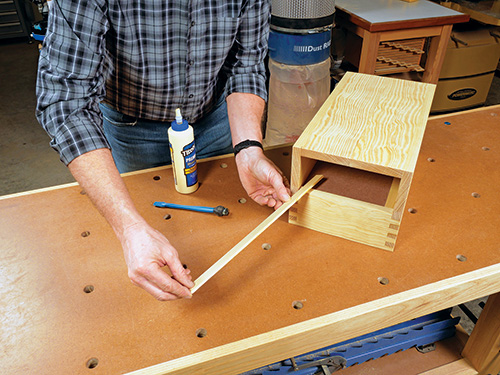Adding drawer guides to interior of glue caddy