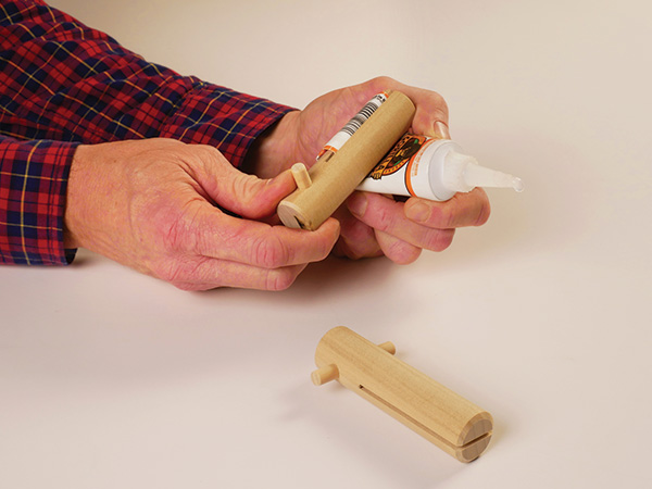 Adhesive Tube Dispenser with a Twist