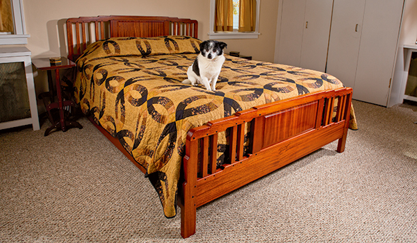Arts and Crafts style bed with slatted construction
