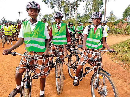 Kenyan students riding donated off road bicycles