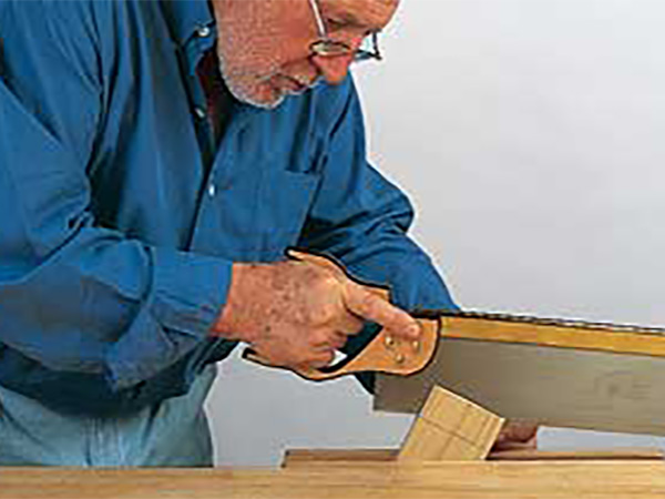 Cutting a tenon with a hand saw