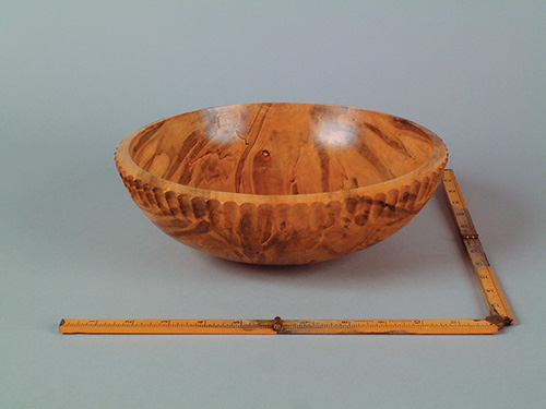 White ash bowl turned from a burl