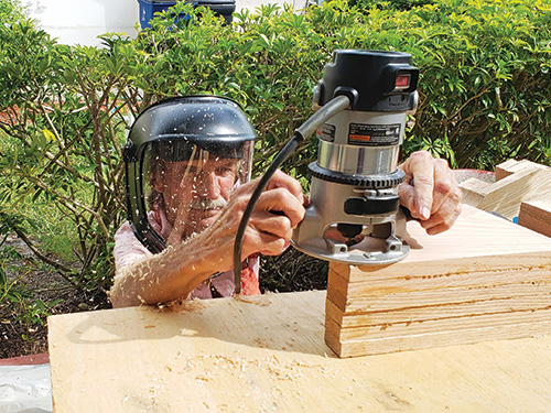 Bill Blix routing wood stack