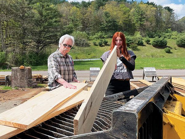 Checking a piece of hemlock lumber