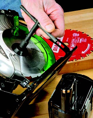 Hitachi provides a hex T-wrench for blade changes, but it doesn’t stow on the saw as do the Allen wrenches of other saws.