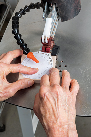 Cutting ornament's center ring with a scroll saw