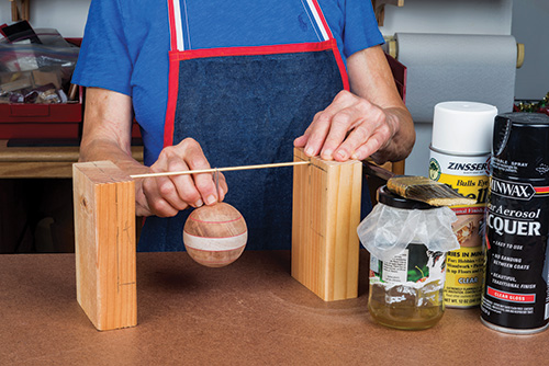 Hanging an ornament for spray finishing