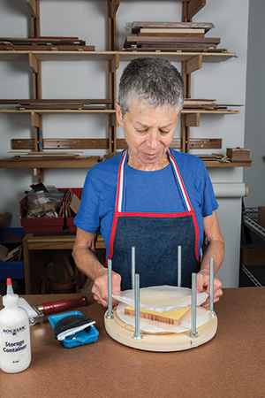 Using a shop-made press to apply veneer