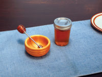 Honey dipper with a turned handle