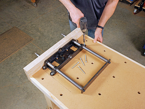 Attaching vise base to underside of workbench tabletop