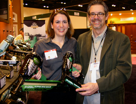 Hitachi's Abigail Bradford holds their monster nailer, while editor Rob Johnstone checks out their new finishing nailer.