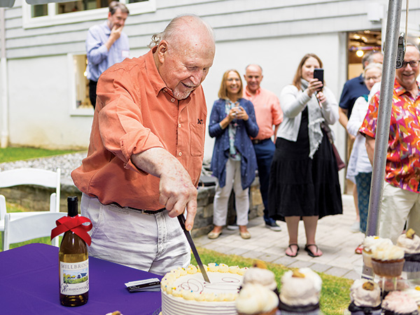 Ian Kirby slices his birthday cake