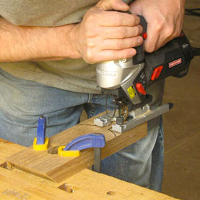Figure 3: Clamp the upright to your workbench before cutting out the wine bottle shape with a jigsaw.
