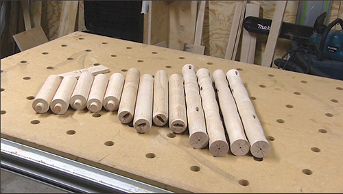 Collection of spindles cut for bench backing and legs