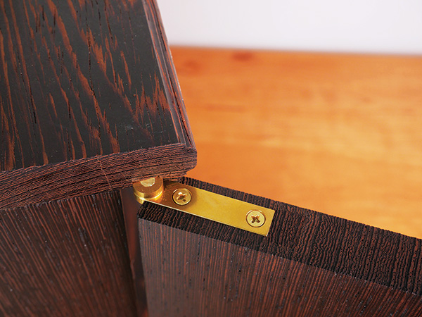 Cabinet door being opened with knife hinge