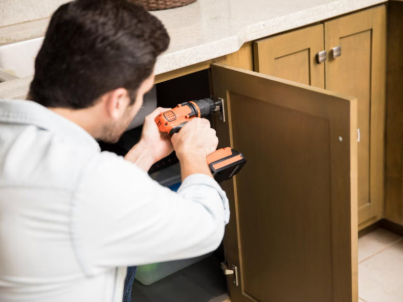Installing kitchen cabinet door