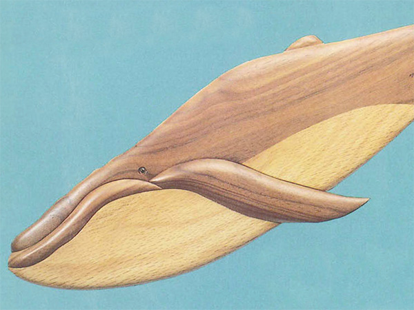 Intarsia whale carving