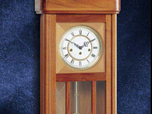 Elegant wood wall clock