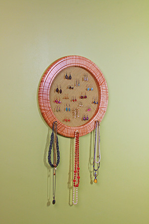 Hanging jewelry holder on wall