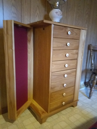 Jewelry cabinet with open side