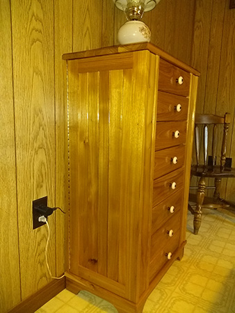 Left side view of closed jewelry cabinet