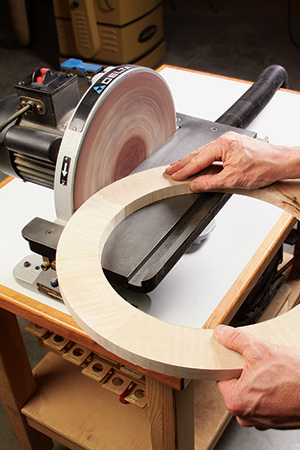 Sanding circular cut smooth with disc sander