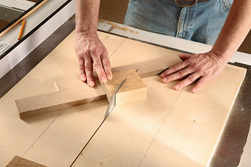 Use a table saw sled to safely cut knife block pieces