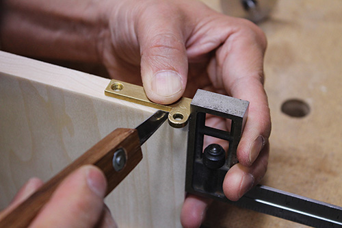 Marking cabinet door hinge on edge