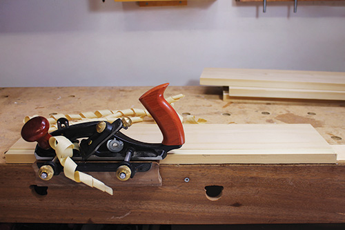 Making forward strokes with a rabbet plane