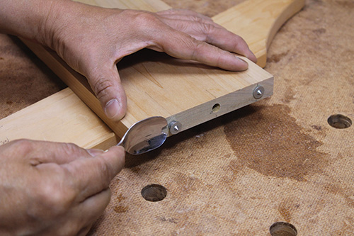 Prying dowel centers with a modified spoon