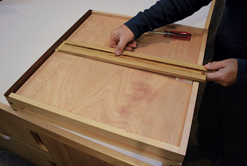 Installing drawer slide to fit into the desk front