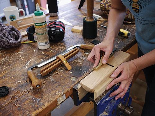 Planing the body of a wooden hand plane for smoothness