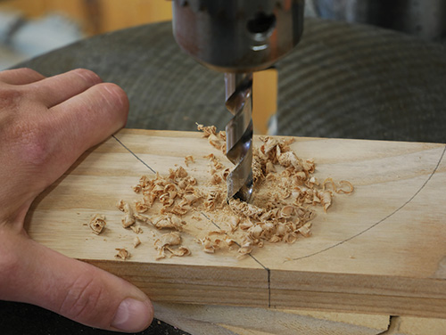 Drilling dowel pin hole in wooden hand plane