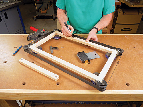 Using band clamp to test fit all parts of mirror frame