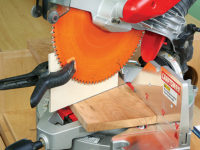 Using board to set up accurate miter cut