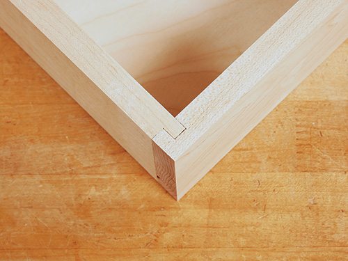 Close look of rabbet and dado drawer frame joint