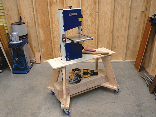 Mobile lathe stand with band saw attached