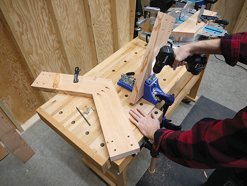 Drilling for bracket installation on lathe stand subassembly