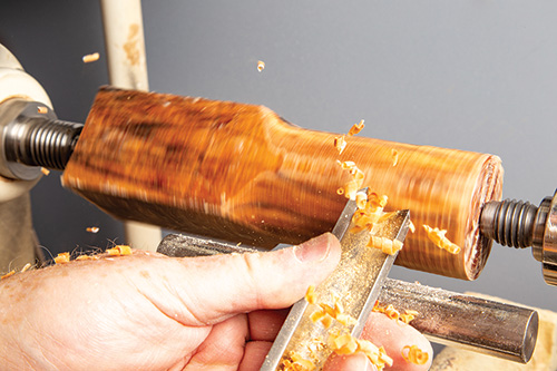 Rounding out olivewood pestle blank