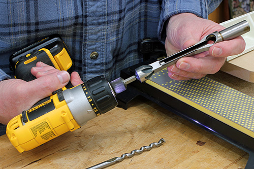 Preparing mortising chisel for sharpening on a drill/driver
