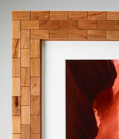 Hardwood mosaic tile overlay on plywood picture frame