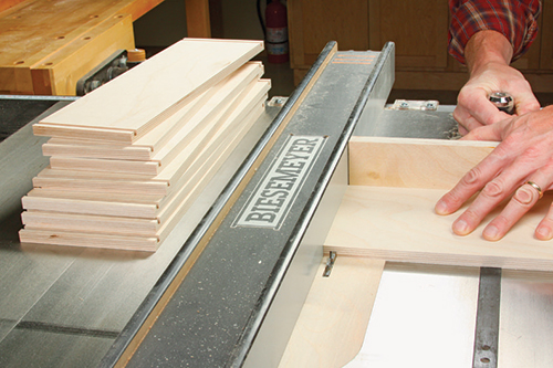 The drawer box joinery began with 1/4" x 1/4" dadoes cut into the inside faces of the drawer sides, 1/4" in from the part ends. Back up these cuts with a miter gauge.