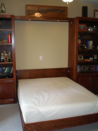 Here is a Murphy bed and bookcases built for a friend whose father could no longer go up and down stairs in his new home. - Ken Keating, Katy Texas