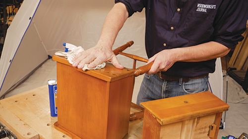 Wiping down old maple table finish with denatured alcohol