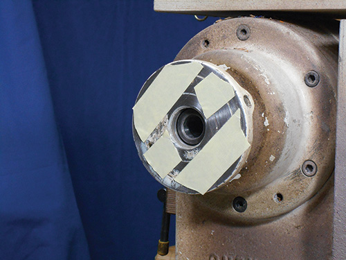 Using double-sided tape to mount a blank on the lathe