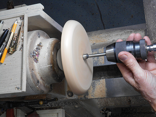 Drilling center hole in blank on a lathe